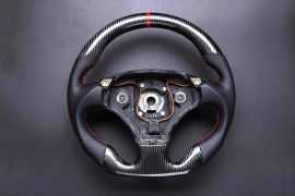 Aston Martin carbon fiber enhanced - custom steering wheel 
